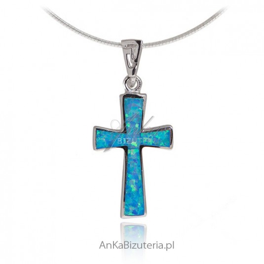 Krzyżyk srebrny z niebieskim opalem.